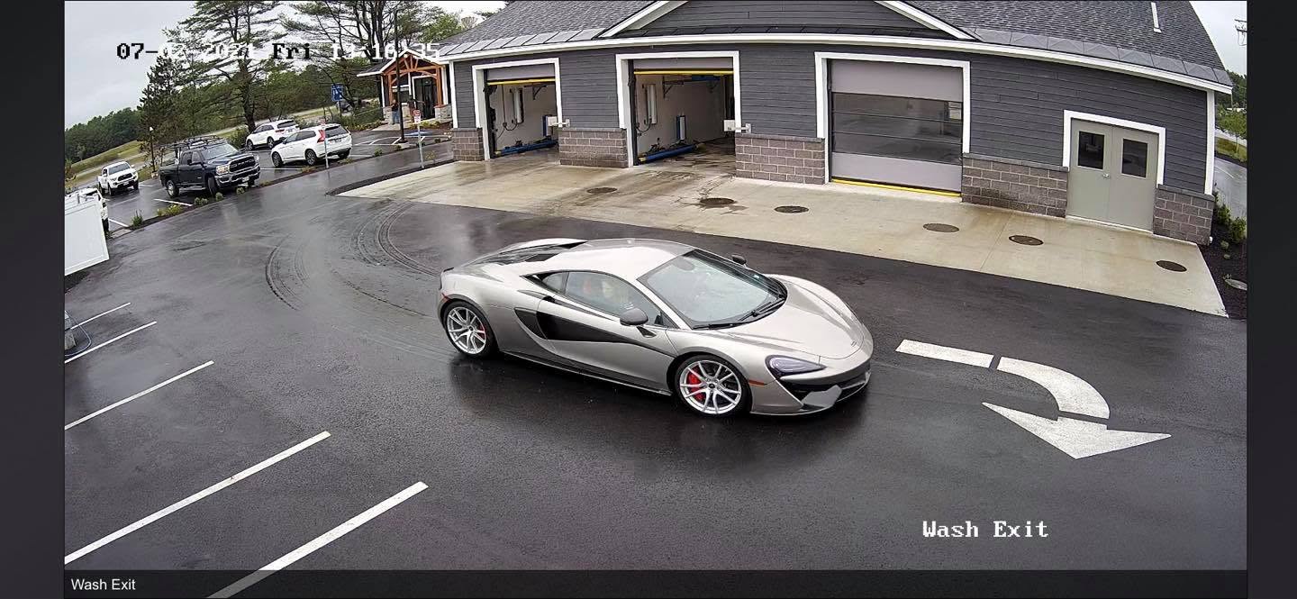 A car leaving the wash