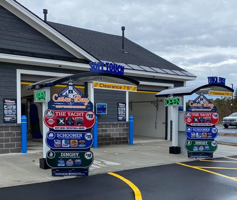 Casco Bay Car Wash bays and pricing signs on Route 1 in Freeport